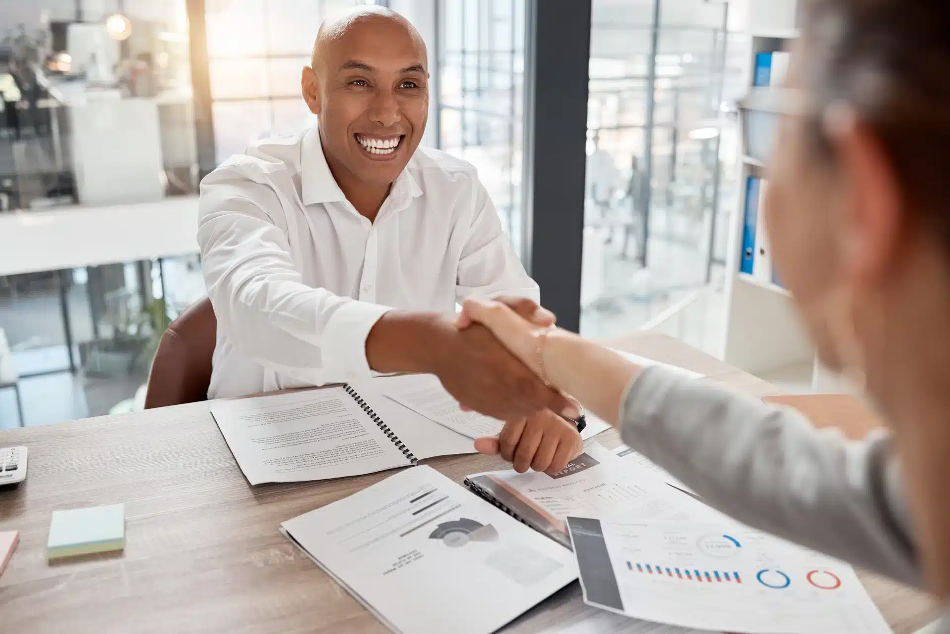 handshake-meeting-and-welcome-with-a-business-man-CRM-Hero.webp