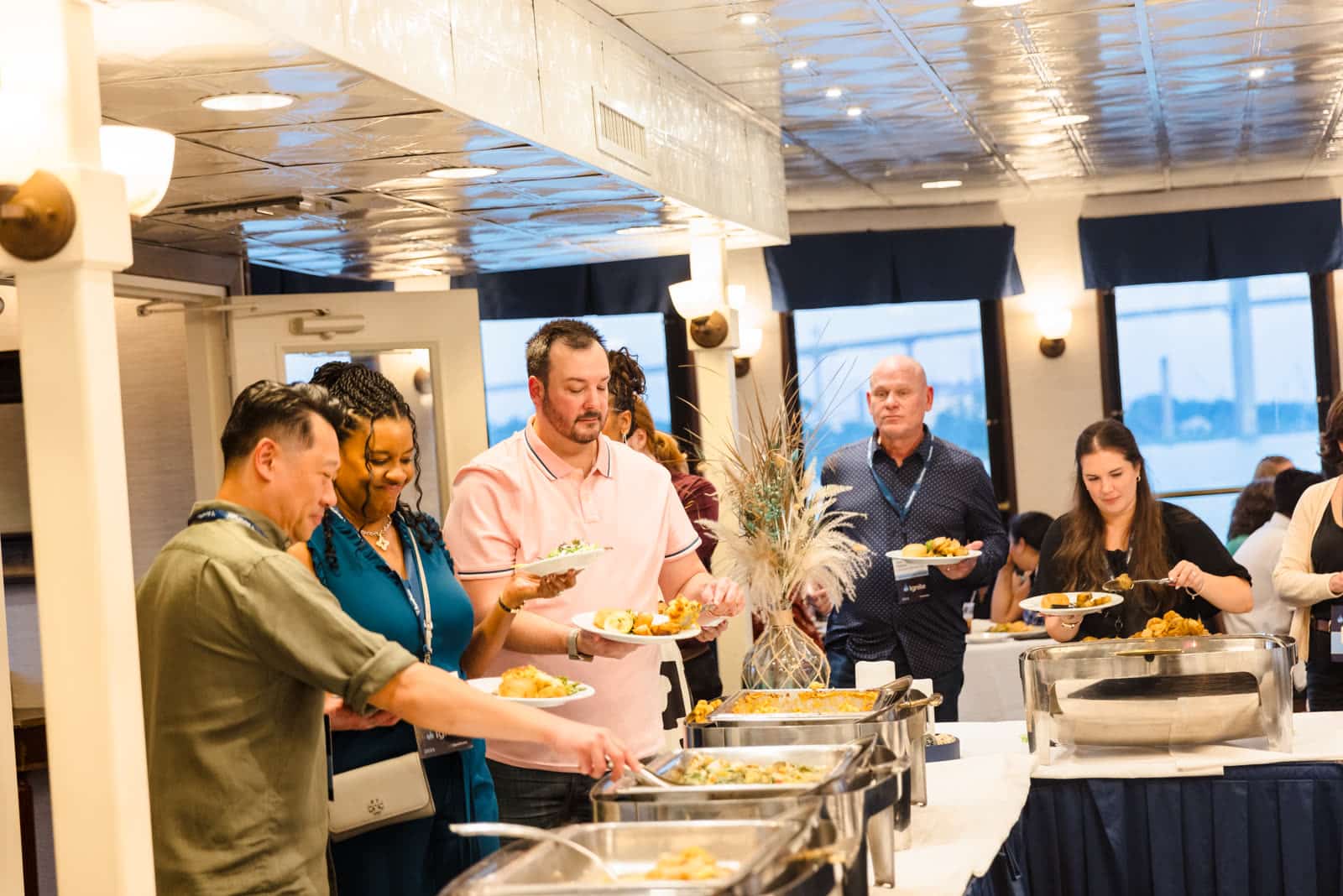 Ignite 2026 attendees at a buffet lunch